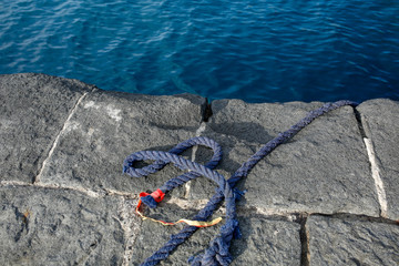 ship rope loop on the stone waterfront