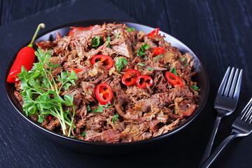 close-up of juicy pulled beef, top view