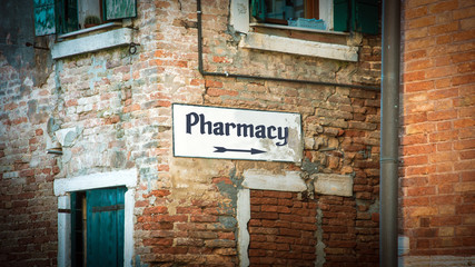 Street Sign to Pharmacy