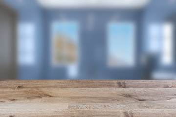 Empty interior with large window. Retro light bulb. The floor is of brown parquet.  3D rendering. wooden table. blurred background