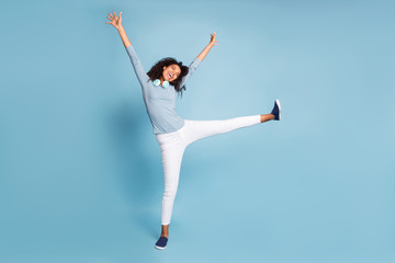 Full length body size photo of cheerful positive cute pretty sweet girlfriend in white trousers rejoicing in weekends started isolated blue pastel color background