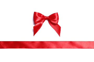 Red ribbon and bow isolated on a white background