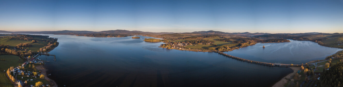The Lipno Reservoir is a dam and hydroelectric plant constructed along the Vltava River in the Czech Republic. This area is mountainous, and borders the Sumava National Park and Nature Reserve