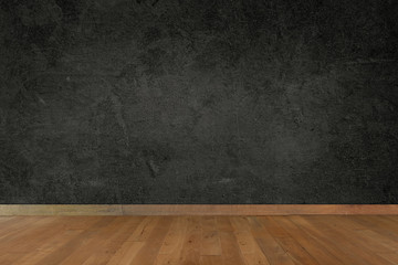 Holzboden und anthrazitfrabene Wand 