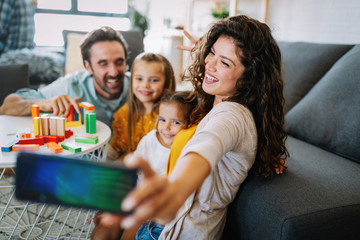 Happy family having fun times at home