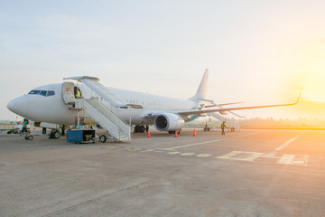Fototapeta na wymiar Airplane at terminal gate ready for takeoff - Modern international airport 