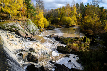 River in the forest with rapids. Autumn. Suburb Of Helsinki, Finland