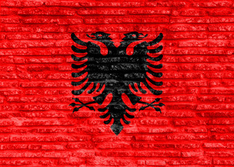 Colorful painted national flag of Albania on old brick wall. Illustration.
