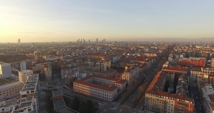 Milan, Italy. A short flight revealing tahe city of Milan and skyscrapers during a clear afternoon.