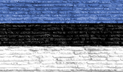 Naklejka premium Colorful painted national flag of Estonia on old brick wall. Illustration.