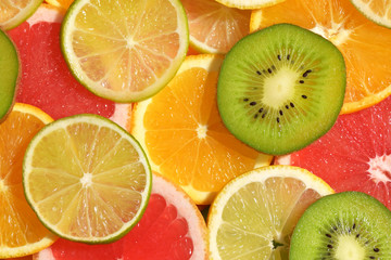 Naklejka na ściany i meble Fruit Background With Lemon, Kiwi, Orange, Tangerine