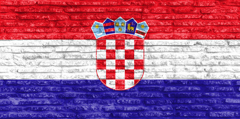 Naklejka premium Colorful painted national flag of Croatia on old brick wall. Illustration.