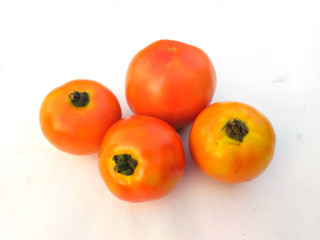 fresh organic tamotoes isolated on white background