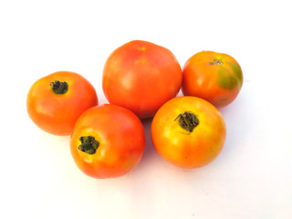 fresh organic tamotoes isolated on white background