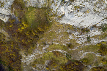 Aerial view of hills in Rhodope mountains with cloudy skies during the autumn 