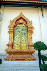 Shutters on windows on temple, Chiang Rai, Thailand