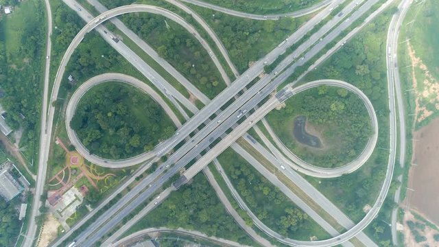 Time lapse aerial view above of circus road traffic cars in bangkok thailand.