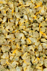 Pickled cooked shelled cockle shellfish meat background