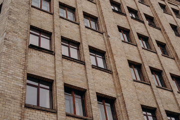 Brick wall and windows of building