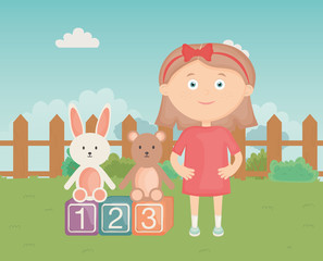 cute girl with blocks rabbit and bear park, kids toys
