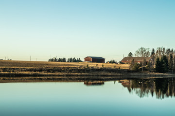 Beautiful autumn landscape of Kymijoki river waters at sunset. Finland, Kymenlaakso, Kouvola