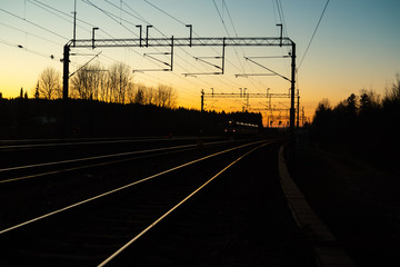 Fototapeta na wymiar Beautiful sunset at railway in Kouvola, Finland.