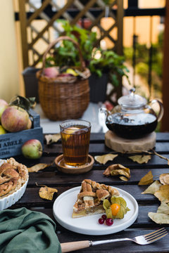 apple pie and teapot with black tea, thanksgiving