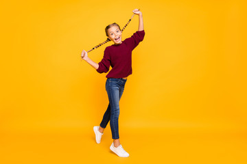 Full length body size view of her she nice attractive lovely girlish crazy comic cheerful cheery pre-teen girl having fun time fooling isolated on bright vivid shine vibrant yellow color background