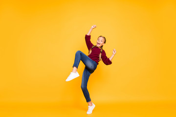 Fototapeta na wymiar Full length body size view of her she nice attractive lovely girlish glad cheerful cheery pre-teen girl having fun rejoicing win winner isolated on bright vivid shine vibrant yellow color background