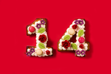 Valentine's Day cake with 14 number shape on red background