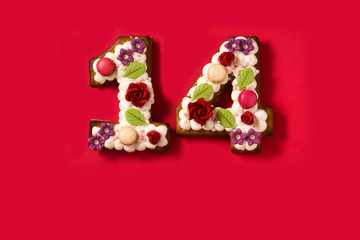 Valentine's Day cake with 14 number shape on red background