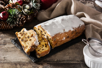 Christmas stollen fruit slice on wooden table	