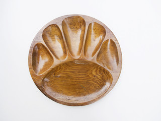 The empty wooden round tray for food container being on the white background.
