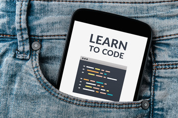 Learn to code concept on smartphone screen in jeans pocket