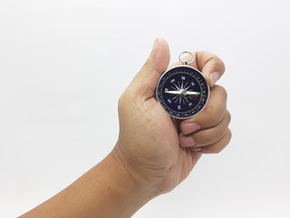 Useful Metallic Dark Needle Magnetic Hand Compass to Show Direction when Camping or Travelling Concept in White Isolated Background