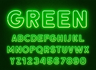 Neon rounded green font, glowing alphabet with numbers. on a dark background.