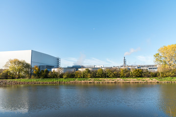 Fototapeta premium Big industrial warehouse in nature