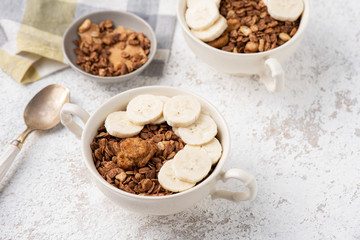 Granola, oatmeal with banana food background