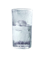 Glass of water with ice on white background