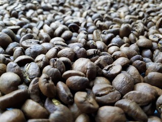  close-up of freshly roasted brown aromatic coffee beans
