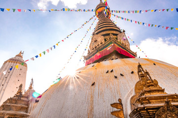 Swayambhunath Stupa, aka The Monkey Temple, during sunrise in Kathmandu, Nepal. A UNESCO Heritage...