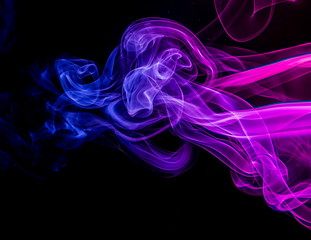 Colored smoke on black background