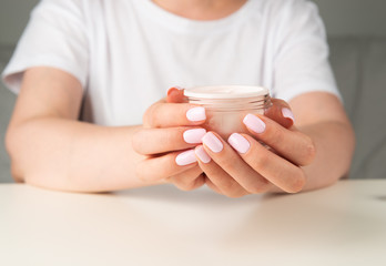 woman hands with cream.