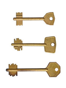 three old keys isolated on a white background