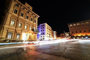 Fototapeta na wymiar night streets and the area of Rome. blurry moving cars. Rome. Europe.
