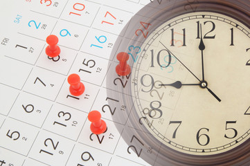 Clock and calendar page with many push pins. Time, planning and appointment concept