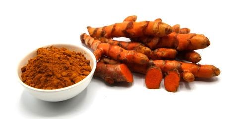 fresh root organic turmeric and Turmeric powder on white background.