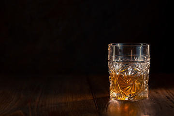 Whiskey in glass with ice