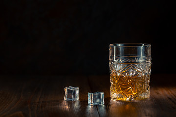 Whiskey in glass with ice