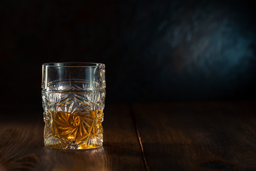 Whiskey in glass with ice